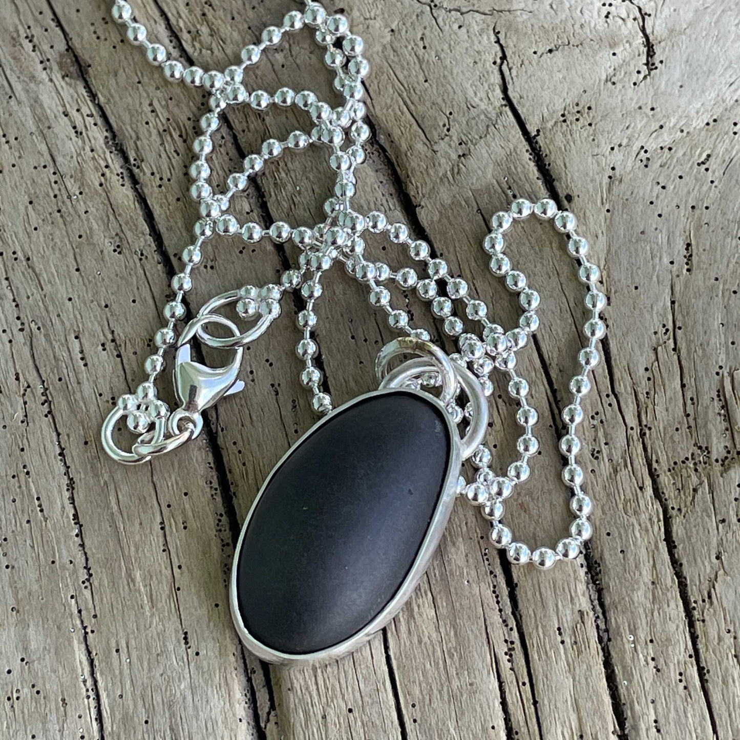 Black Galveston Texas Beach Stone Pendant Necklace in Sterling Silver