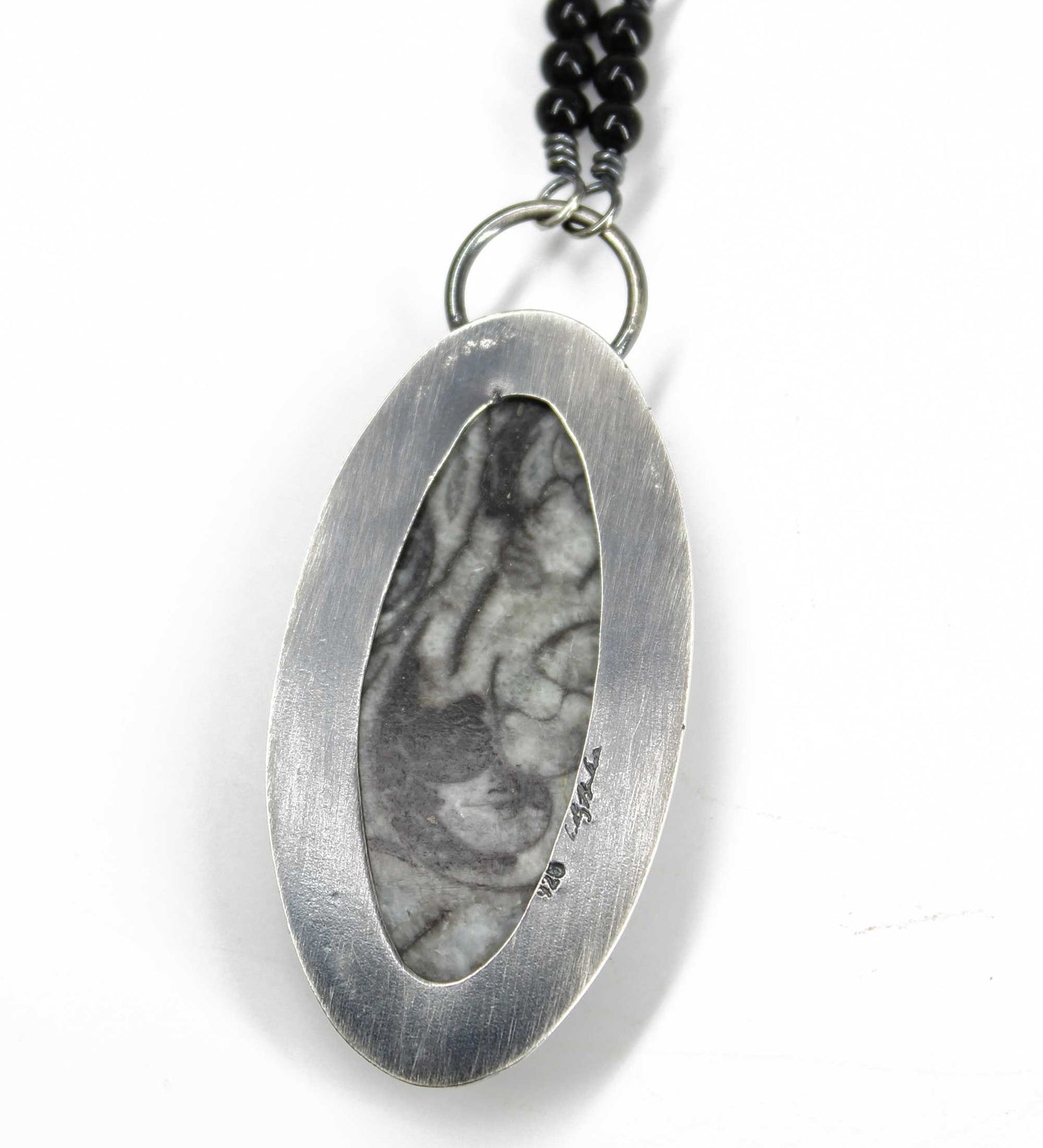 Backside of the Picasso Ammonite Necklace