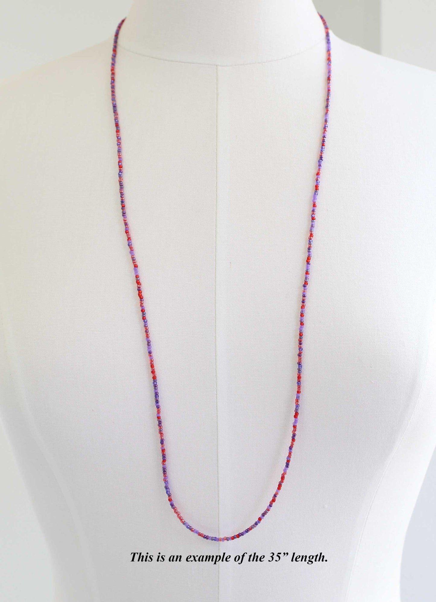 Multicolored beaded necklace on a mannequin 35