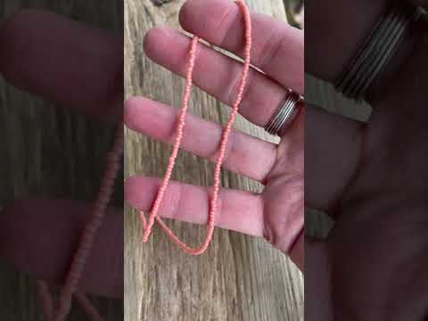 Load and play video in Gallery viewer, Salmon Pink Seed Bead Necklace
