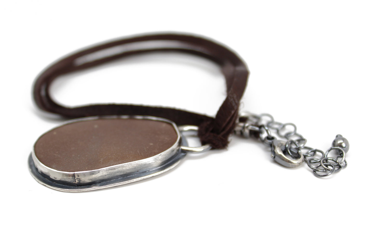 Handcrafted Brown Beach Stone Pendant in Sterling Silver with Deer Skin Lace