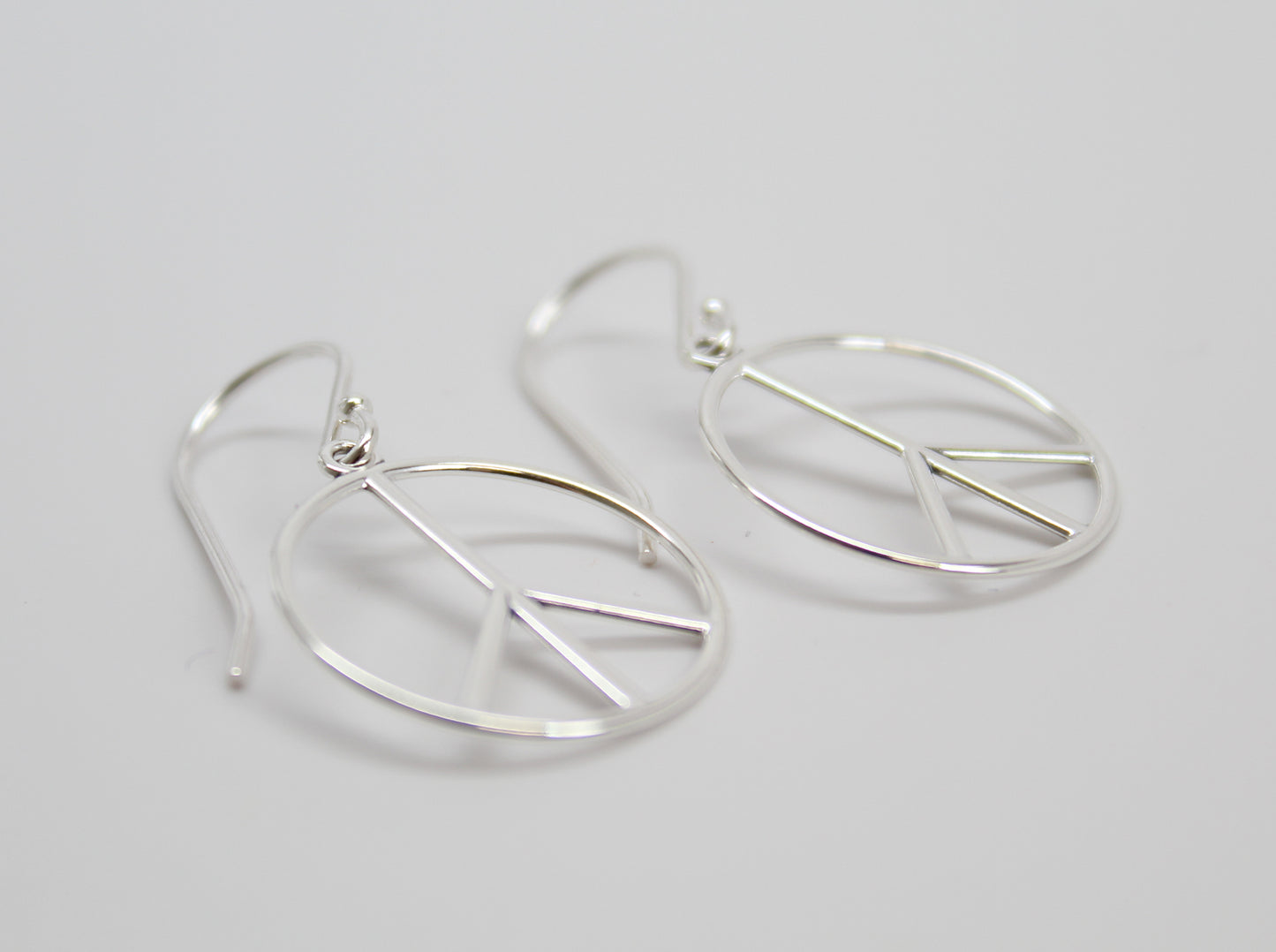 Peace Sign Dangle Earrings in Sterling Silver