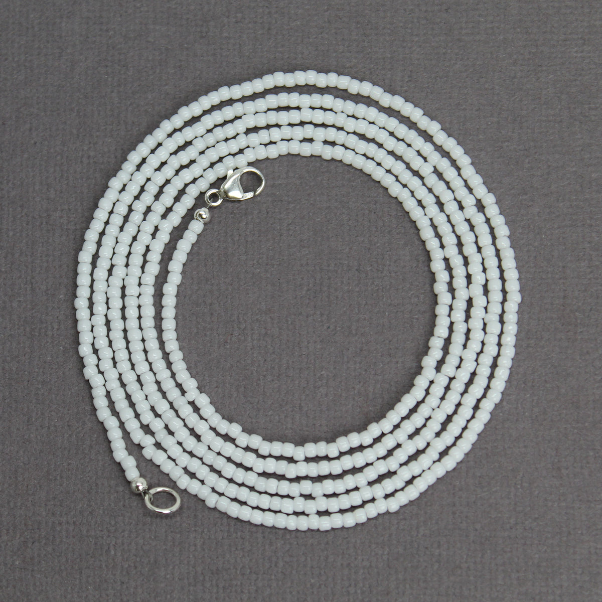 Gray, Black and White 24-Strand Beaded Bracelet