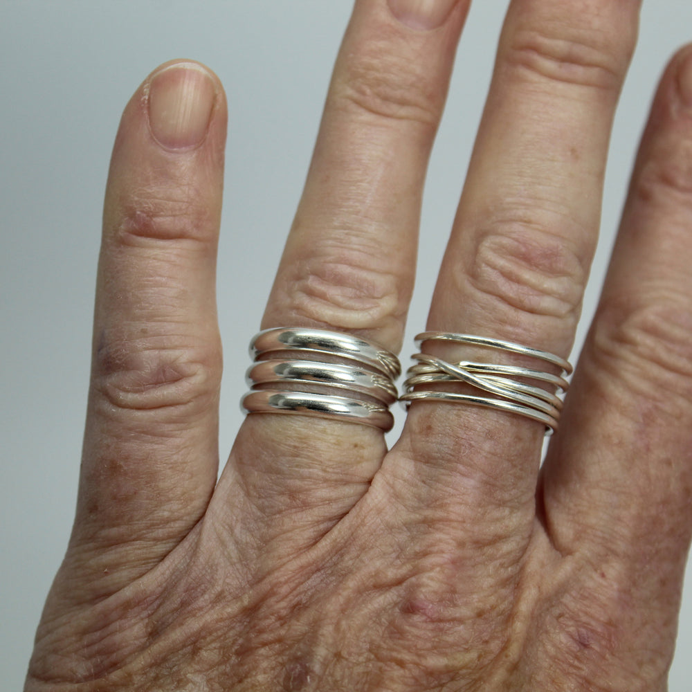 
                      
                        Three Sterling Silver Stacked Ring Band, Size 7 US
                      
                    