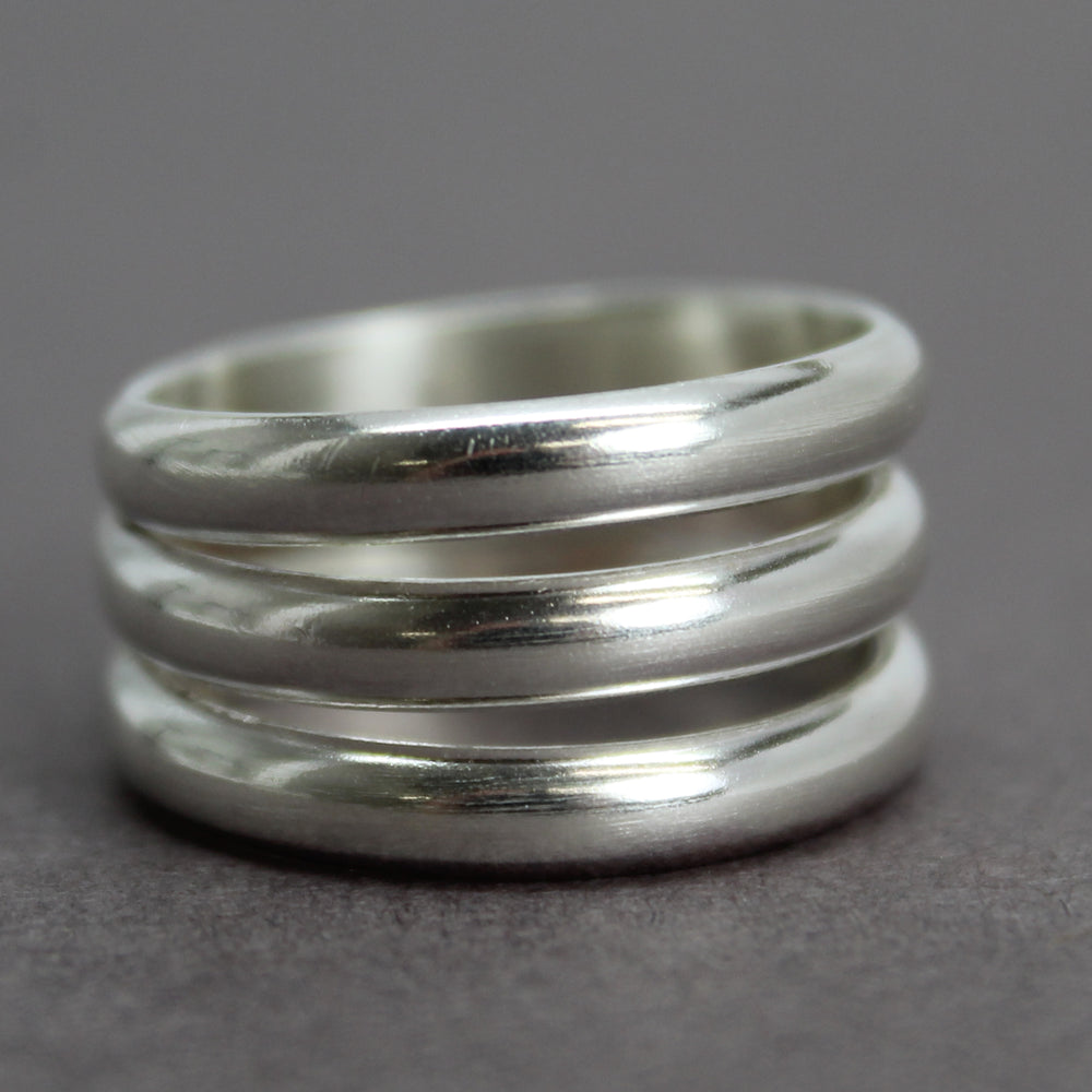 
                      
                        Three Sterling Silver Stacked Ring Band, Size 7 US
                      
                    