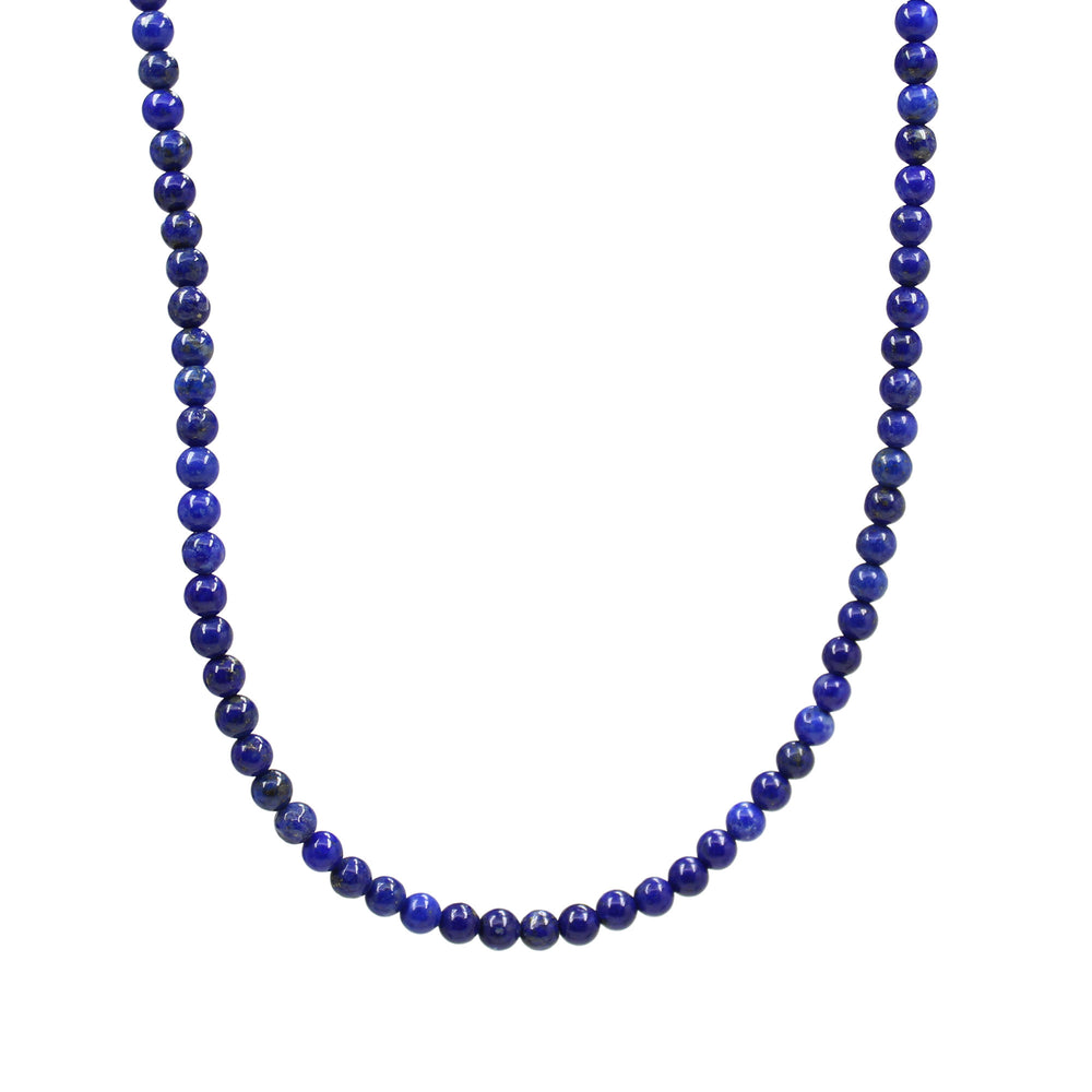 
                      
                        Lapis lazuli beaded necklace on a white background
                      
                    