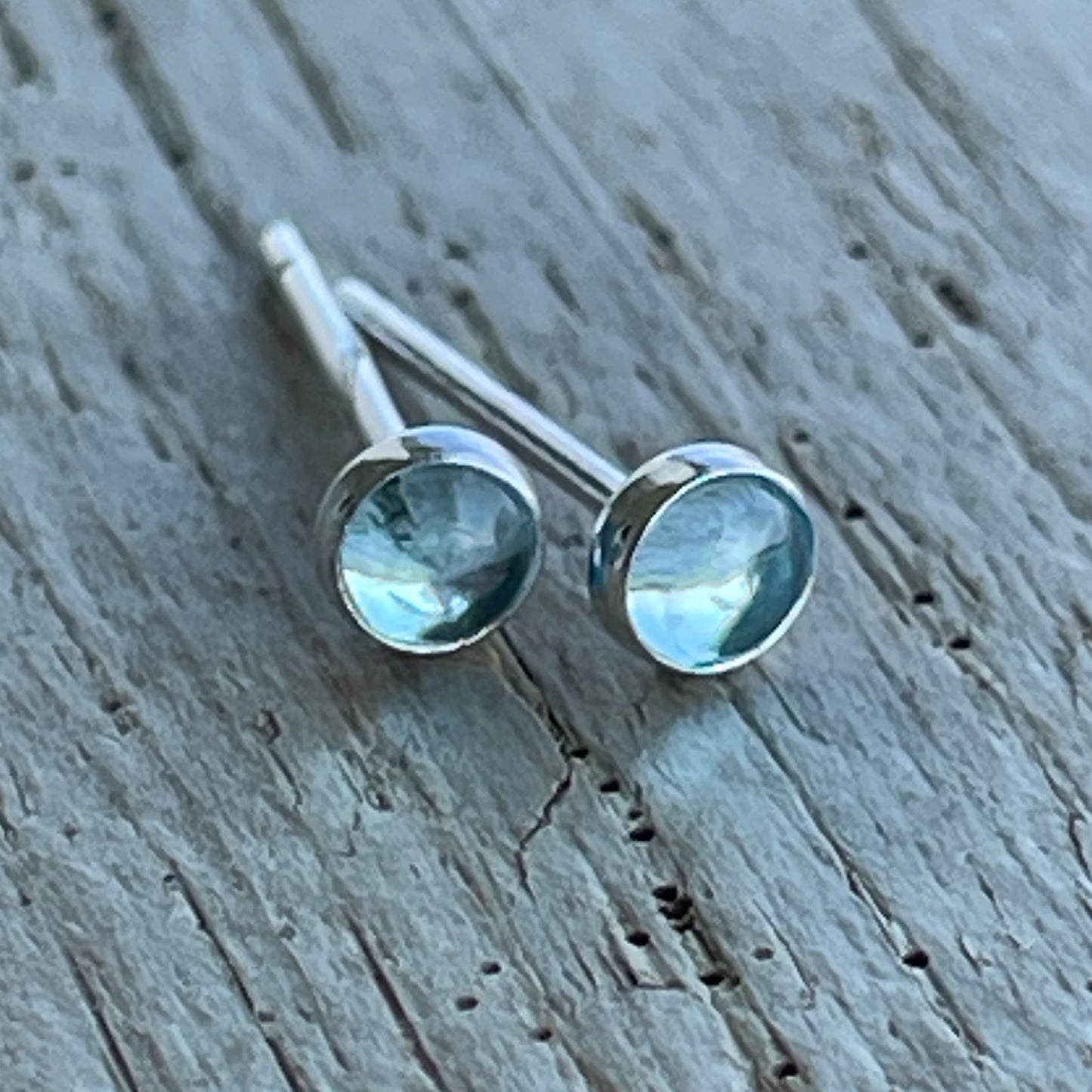 Tiny Swiss Blue Topaz Stud Earrings in Sterling Silver