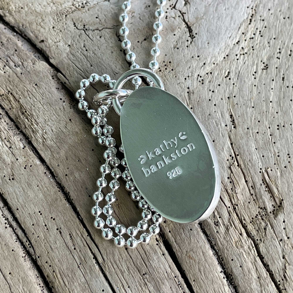 
                      
                        Black Galveston Texas Beach Stone Pendant Necklace in Sterling Silver
                      
                    