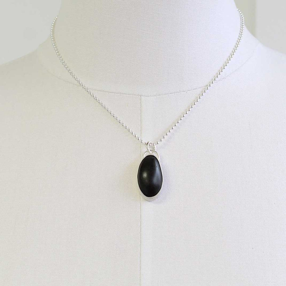 
                      
                        Black Galveston Texas Beach Stone Pendant Necklace in Sterling Silver
                      
                    