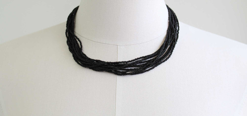 
                      
                        Multi Strand Matte Black Seed Bead Necklace 18 Inches
                      
                    