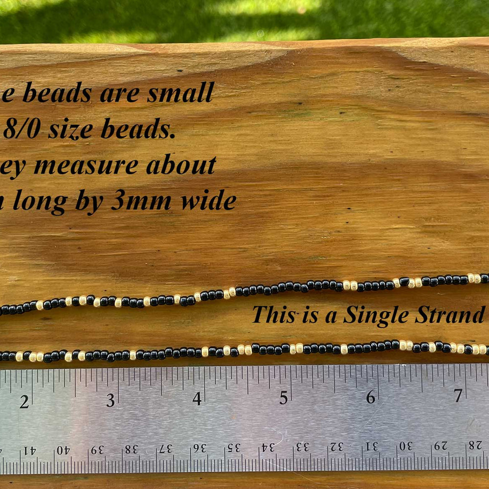 
                      
                        Black and Gold Seed Bead Necklace, Thin 2mm Single Strand
                      
                    