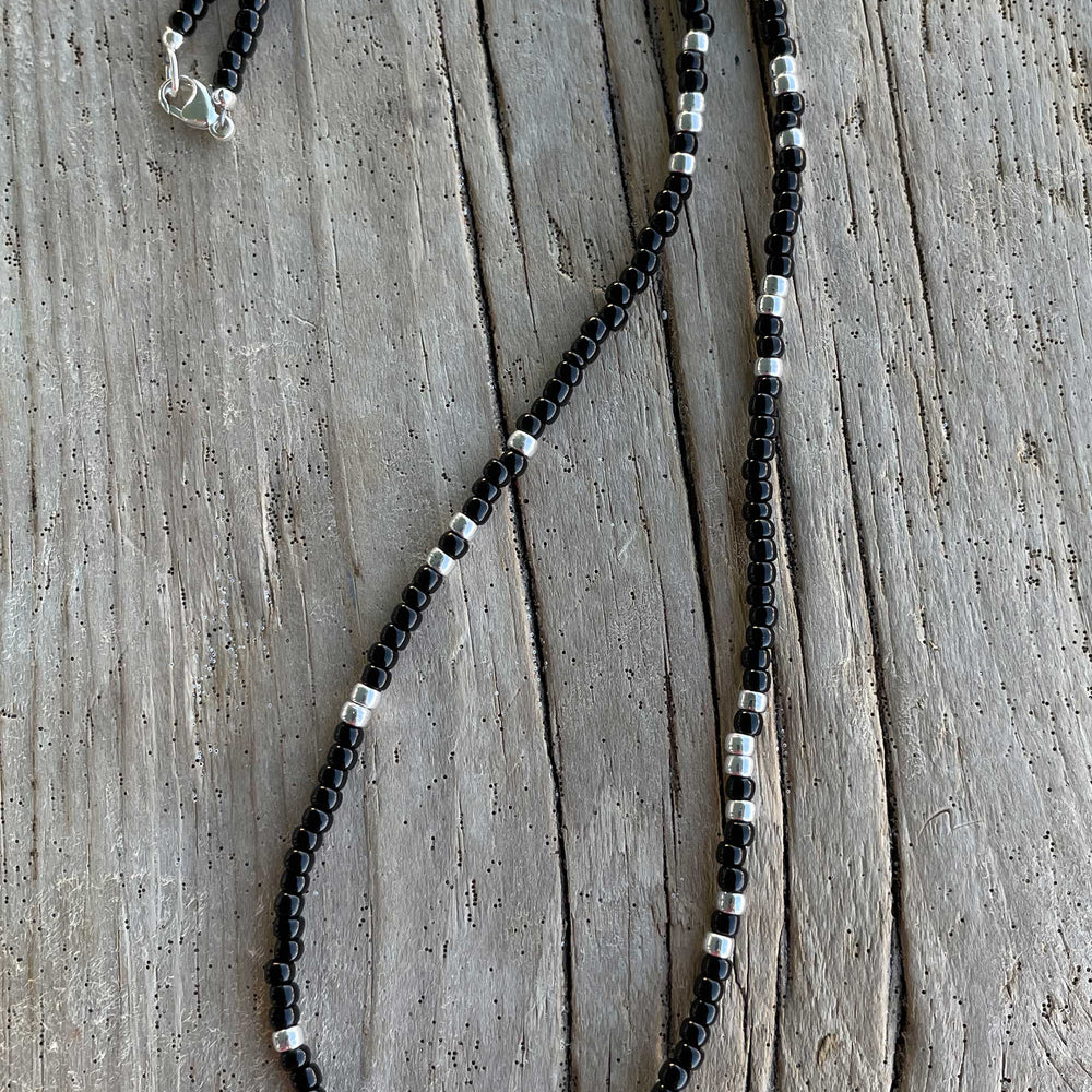 
                      
                        Black and Silver Seed Bead Necklace
                      
                    