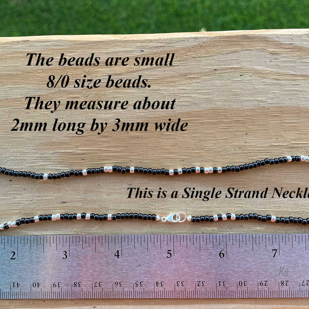 
                      
                        Black and Silver Seed Bead Necklace
                      
                    