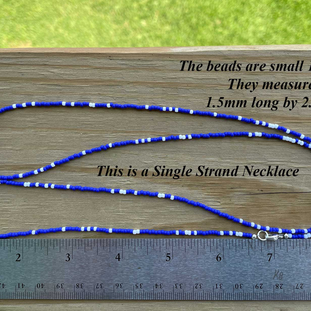 
                      
                        Frosted Navy Blue and White Seed Bead Necklace
                      
                    