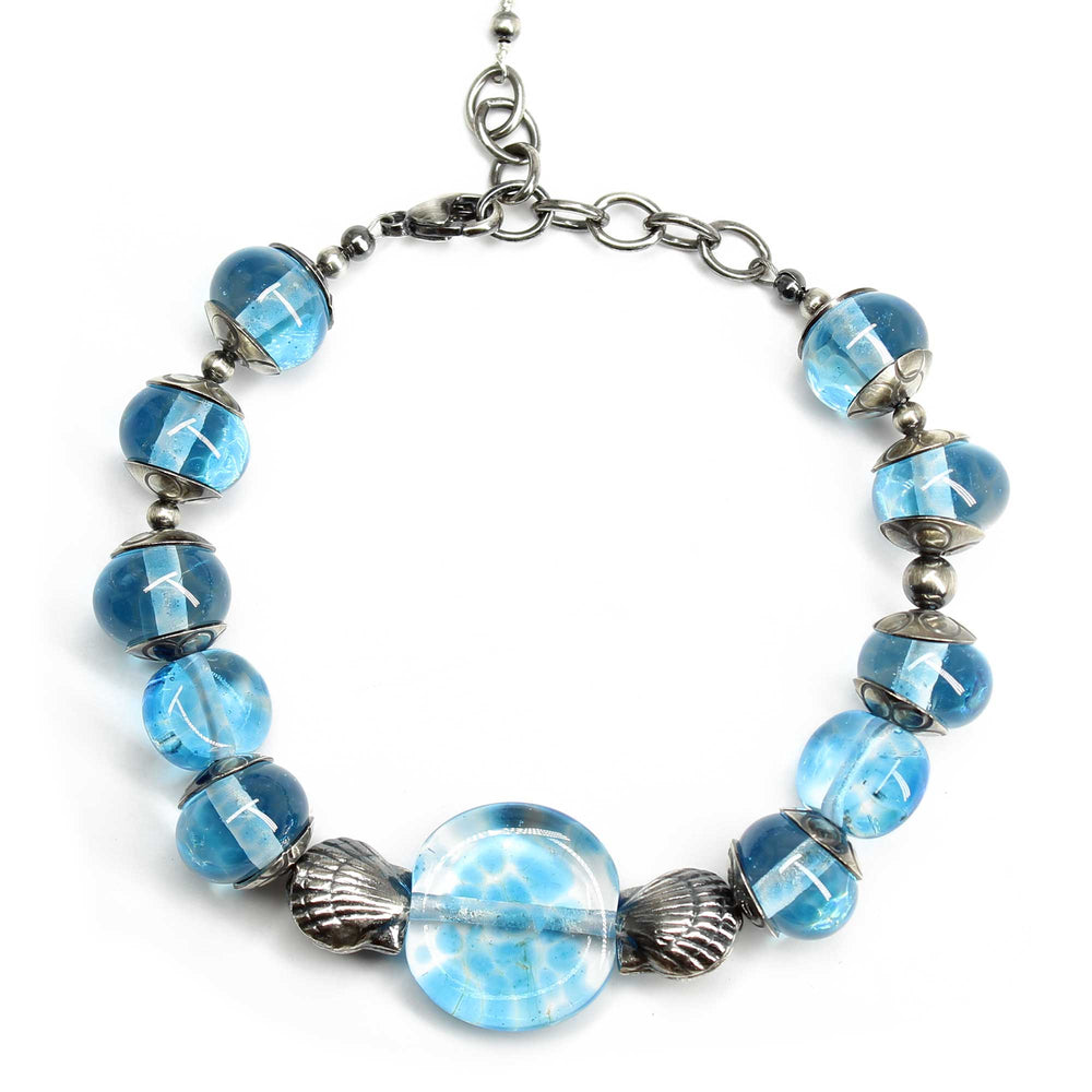 
                      
                        Blue Lampwork Bracelet with Sterling Silver Shells

                      
                    