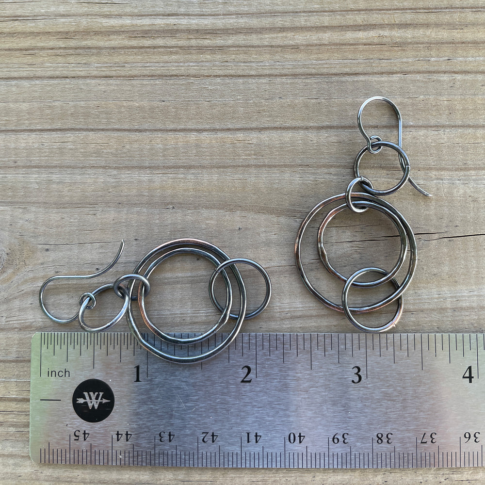 
                      
                        Copper Floating Circle Hoop Earrings with Sterling Silver Ear Wires 
                      
                    