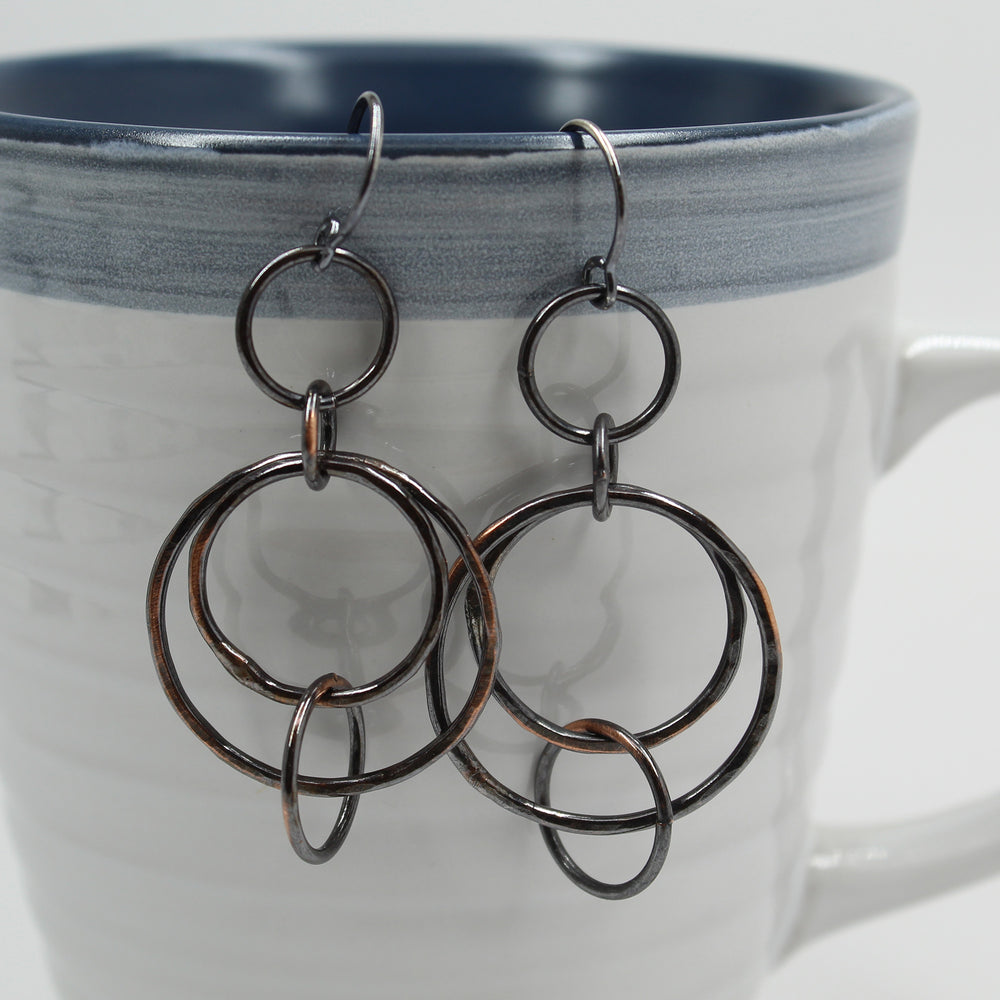 
                      
                        Copper Floating Circle Hoop Earrings with Sterling Silver Ear Wires 
                      
                    