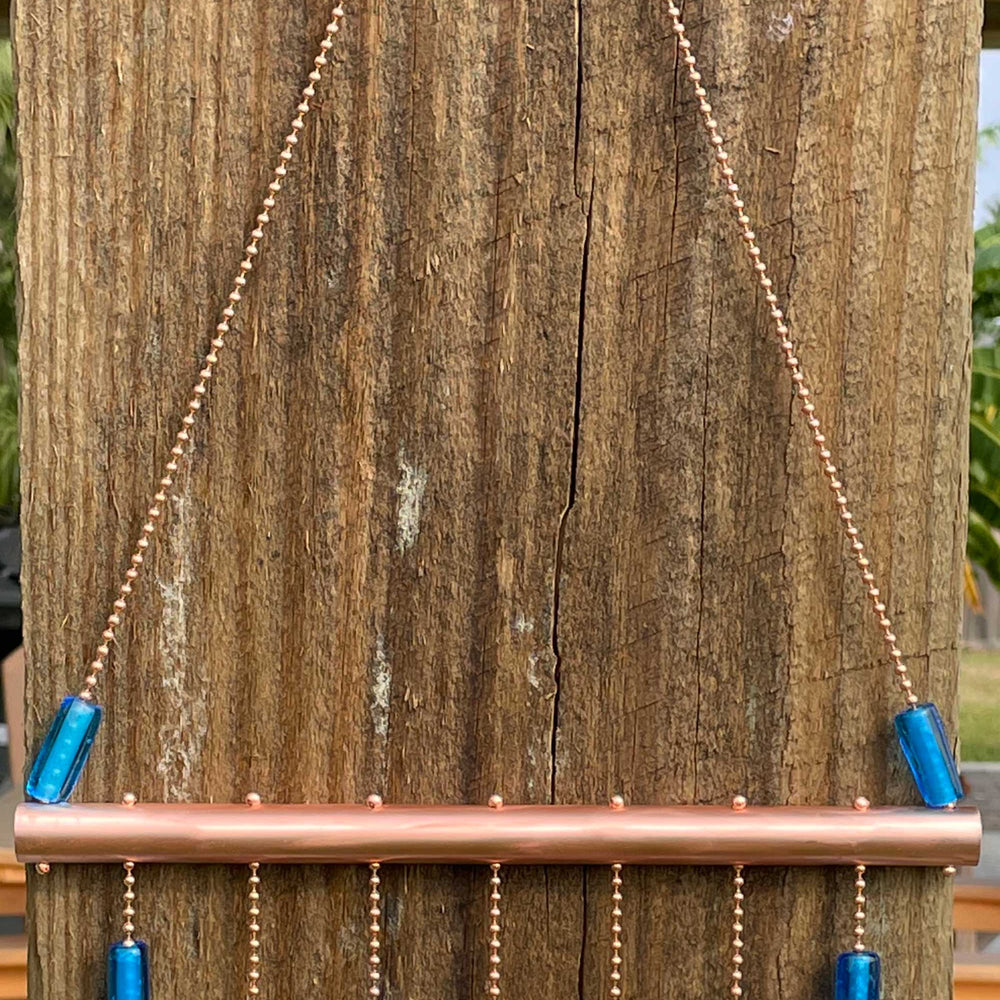 
                      
                        Bohemian Copper Windchime with Aqua Blue Beads
                      
                    