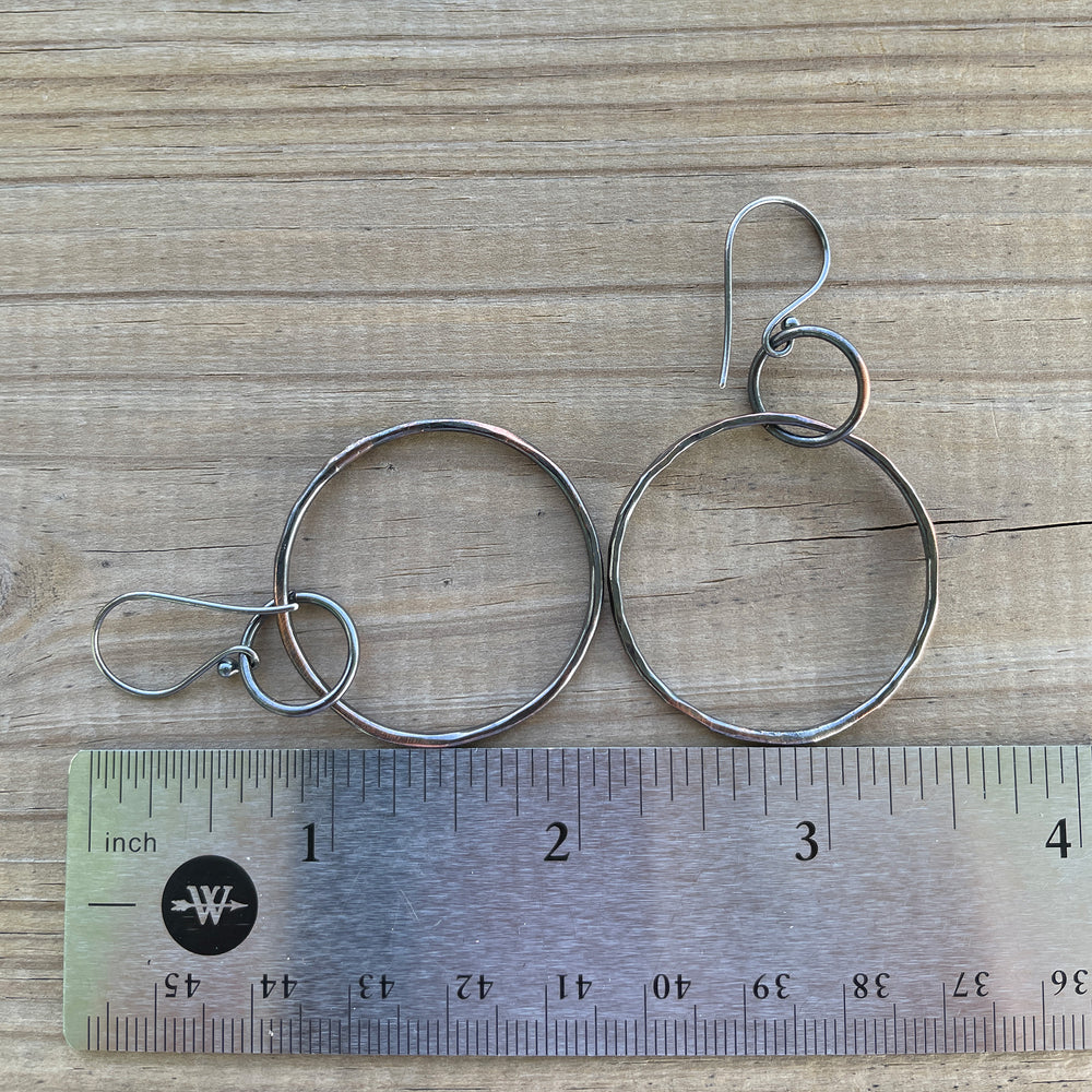 
                      
                        Rustic Hammered Copper Hoop Earrings with Sterling Silver Wires 2.25" L x 1.25" W
                      
                    