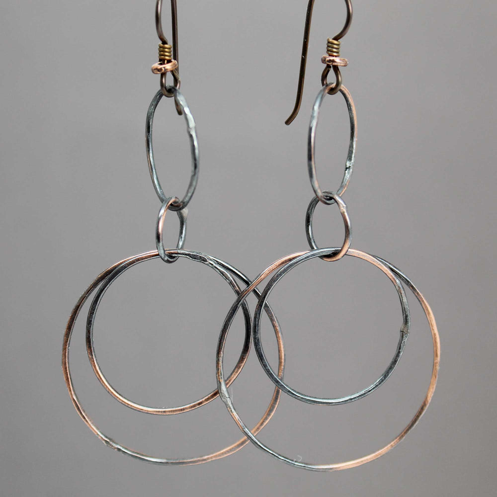 
                      
                        Handmade Long Copper Hoop Earrings
                      
                    