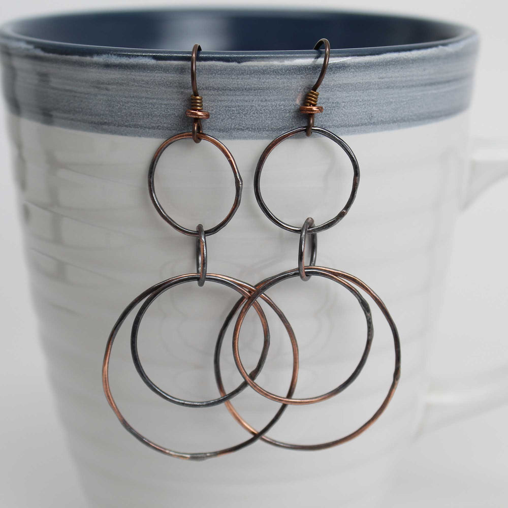 
                      
                        Handmade Long Copper Hoop Earrings
                      
                    