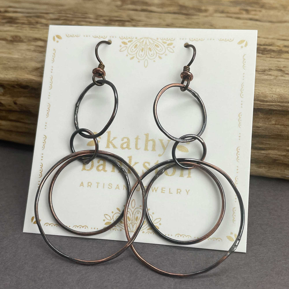 
                      
                        Handmade Long Copper Hoop Earrings
                      
                    