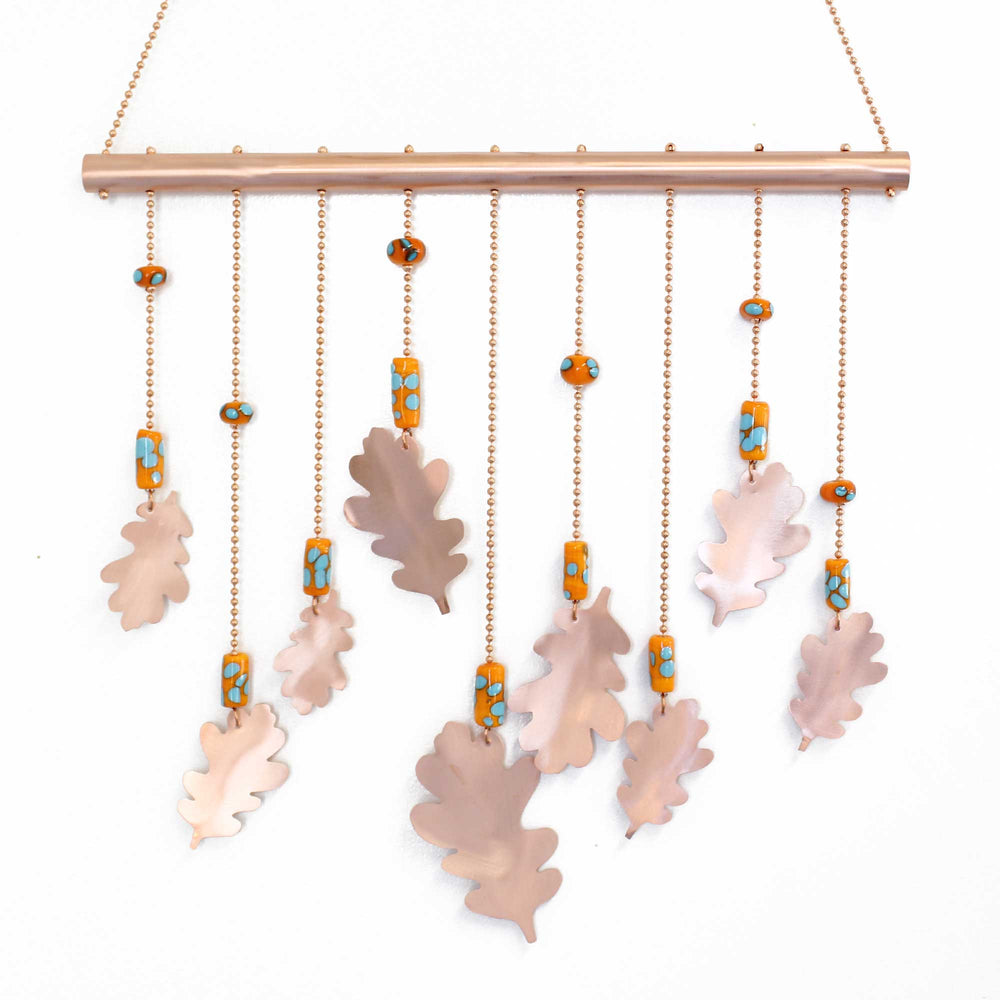 
                      
                        Copper Wind Chime with Oak Leaves and Orange and Turquoise Beads

                      
                    