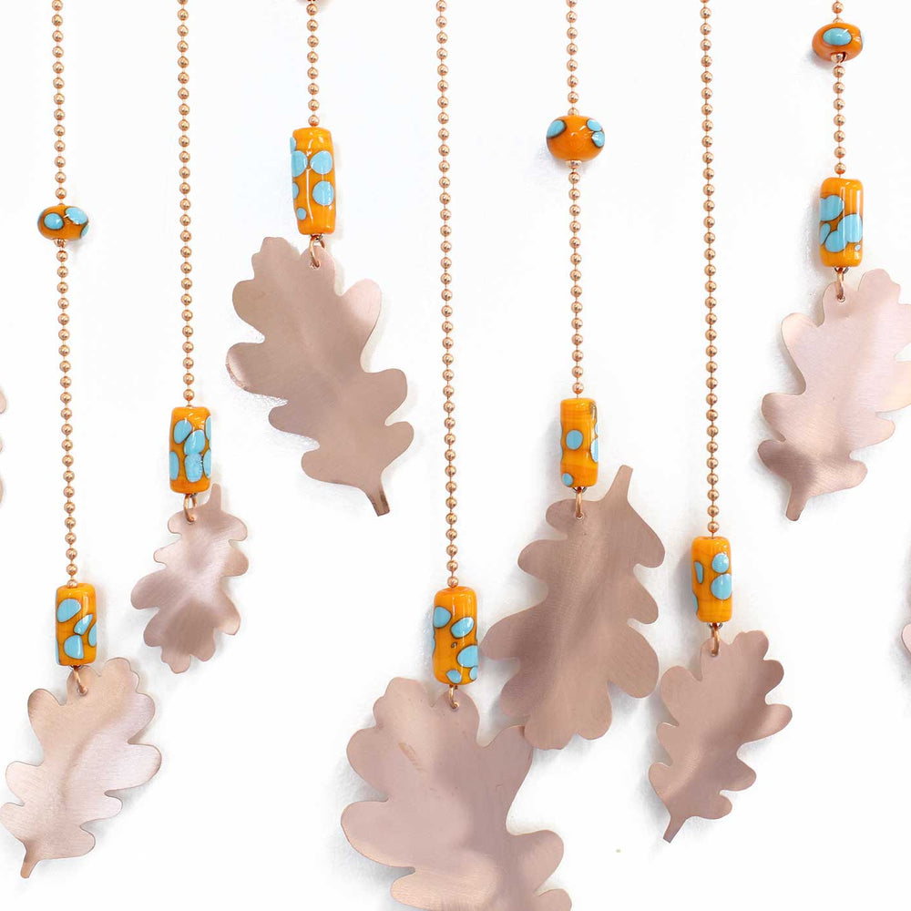 
                      
                        Copper Wind Chime with Oak Leaves and Orange and Turquoise Beads
                      
                    