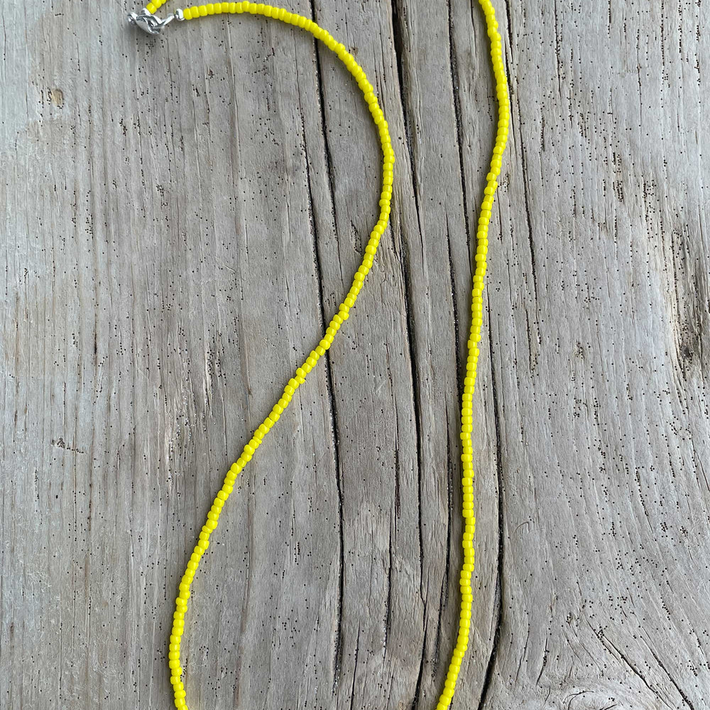 
                      
                        Dandelion Yellow Seed Bead Necklace 
                      
                    