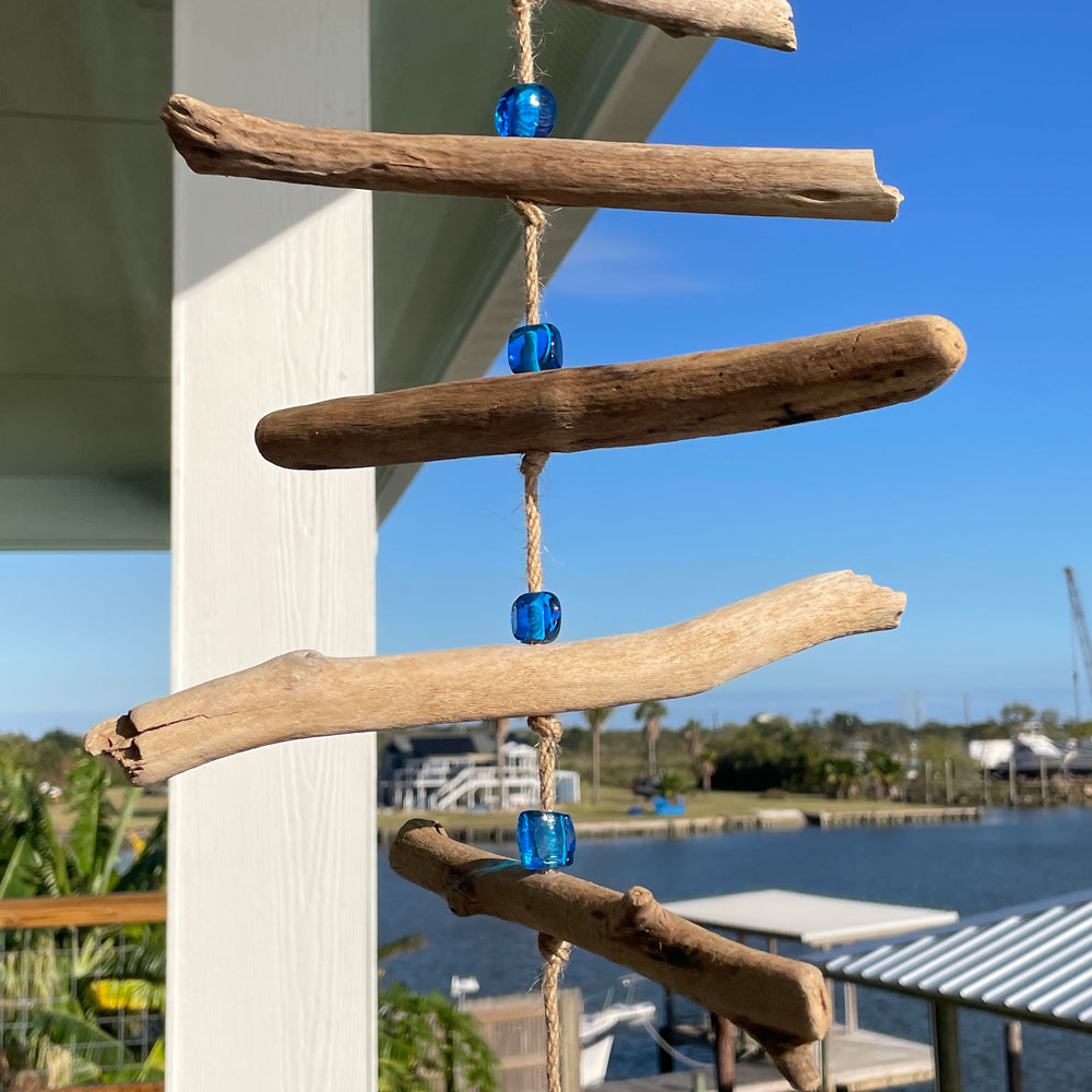 
                      
                        Driftwood and Shell Mobile with Aqua Blue Beads
                      
                    