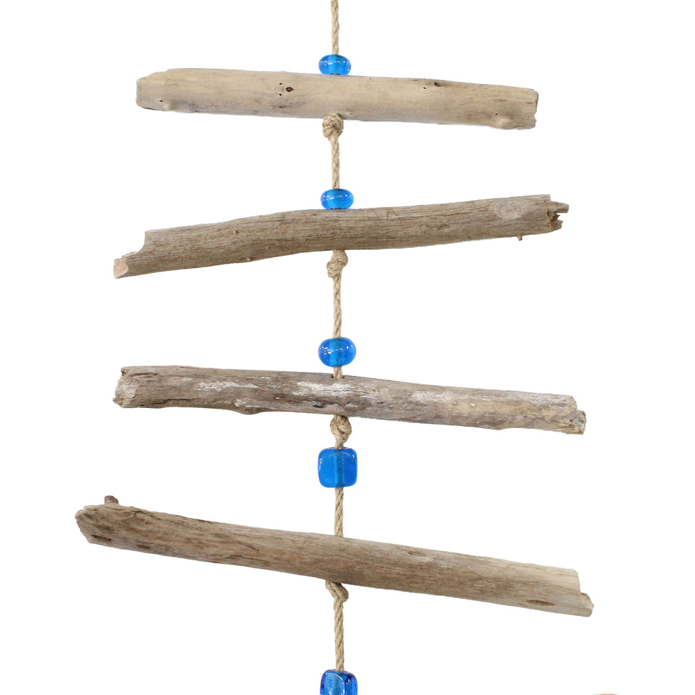 
                      
                        Driftwood hanging decor with blue beads on a white background
                      
                    