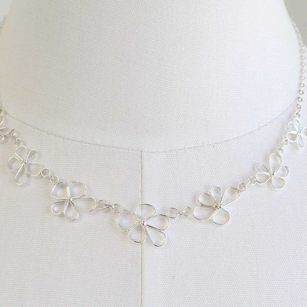 
                      
                        Petals in the Wind Necklace - Delicate Sterling Silver Flower Necklace
                      
                    
