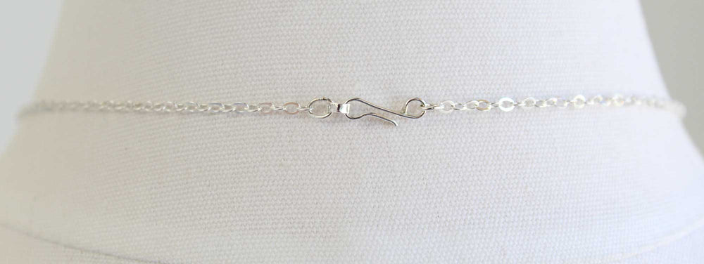 
                      
                        Petals in the Wind Necklace - Delicate Sterling Silver Flower Necklace
                      
                    