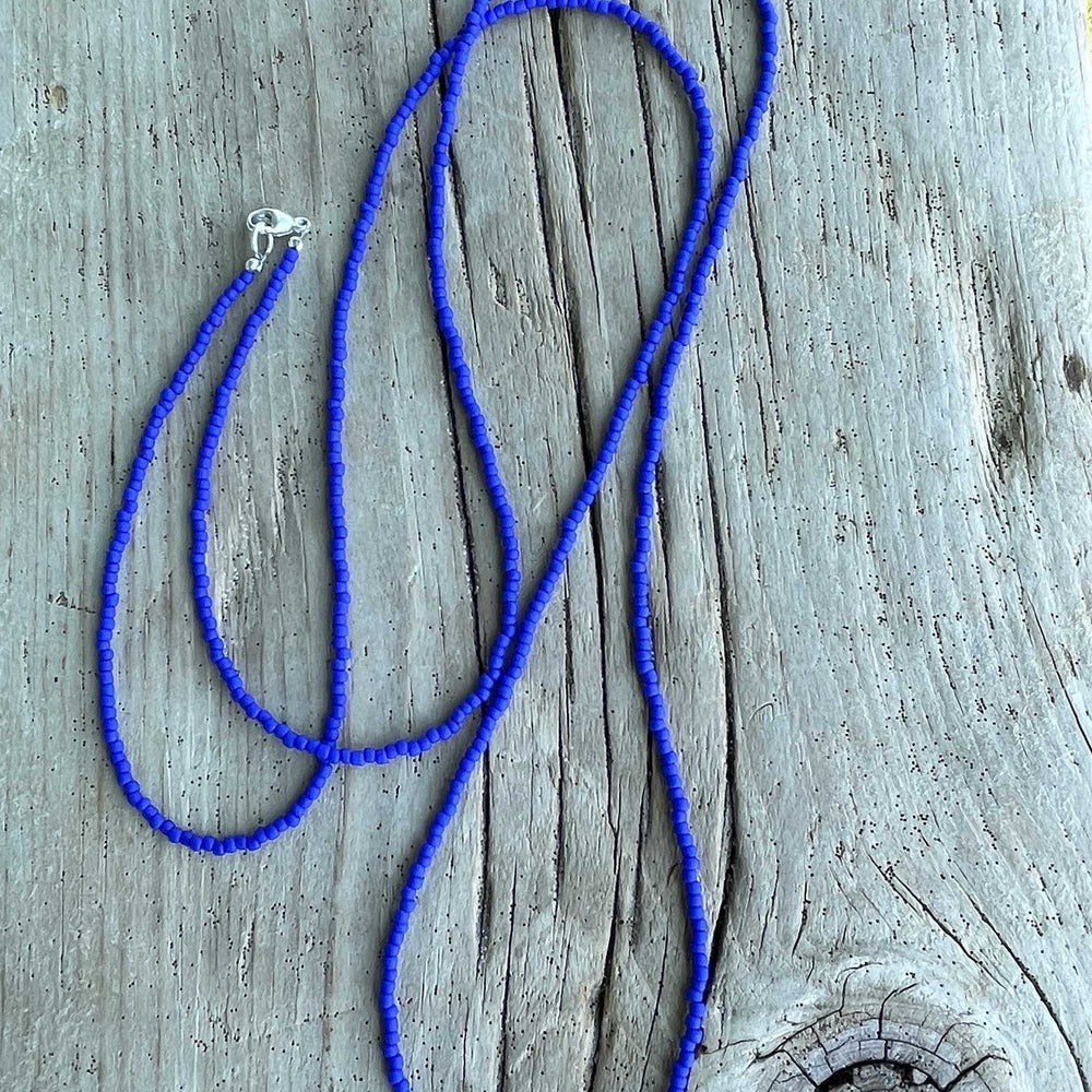 
                      
                        Frosted Navy Blue Seed Bead Necklace
                      
                    