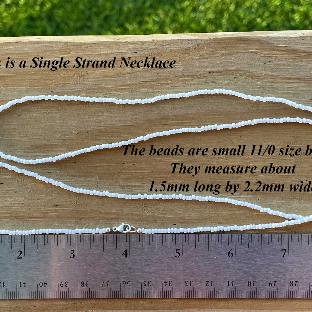 
                      
                        Frosted Matte White Seed Bead Necklace
                      
                    