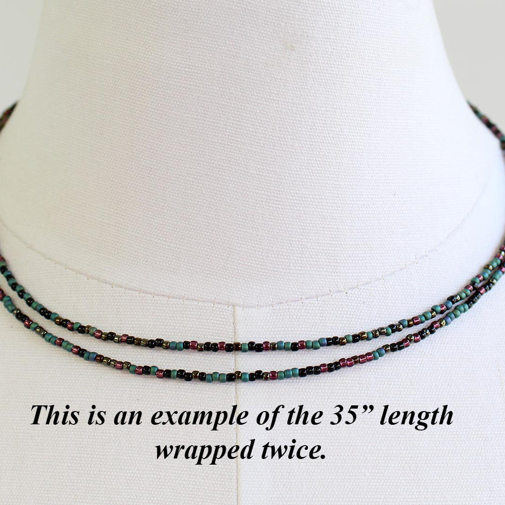 
                      
                        Mixed Teal Green Black and Plum Seed Bead Necklace
                      
                    