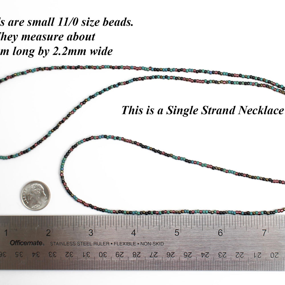 
                      
                        Mixed Teal Green Black and Plum Seed Bead Necklace
                      
                    