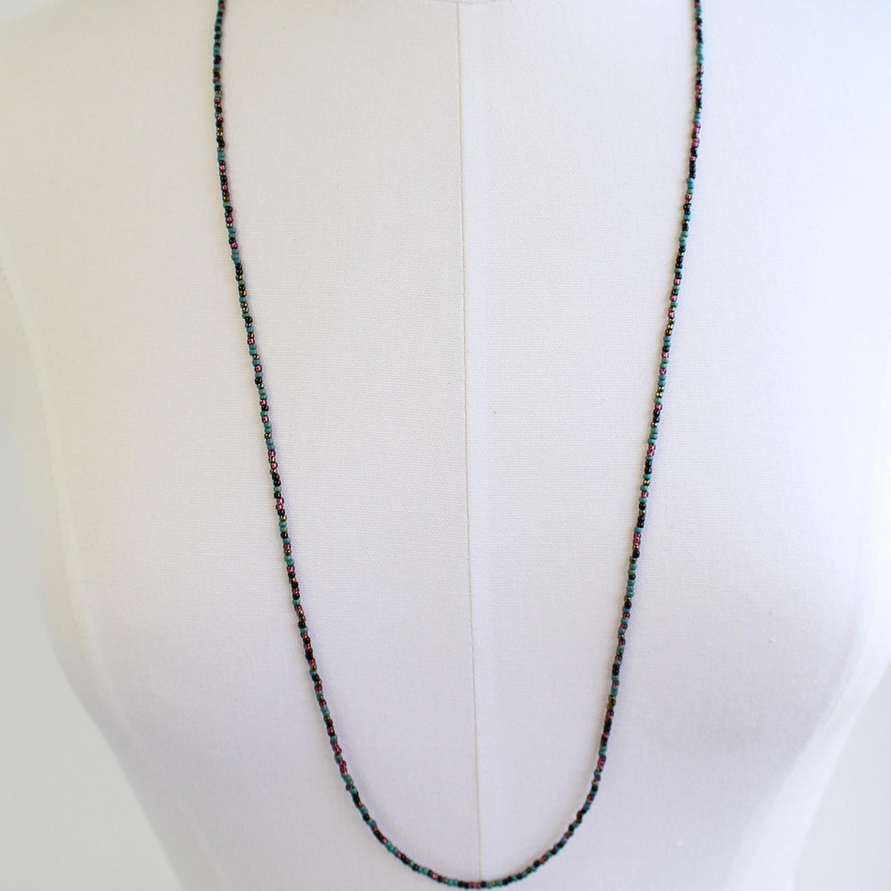 
                      
                        Mixed Teal Green Black and Plum Seed Bead Necklace
                      
                    