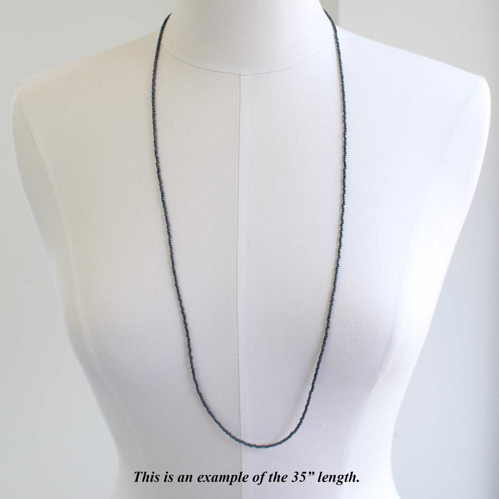 
                      
                        Matte Gun Metal Grey Seed Bead Necklace
                      
                    