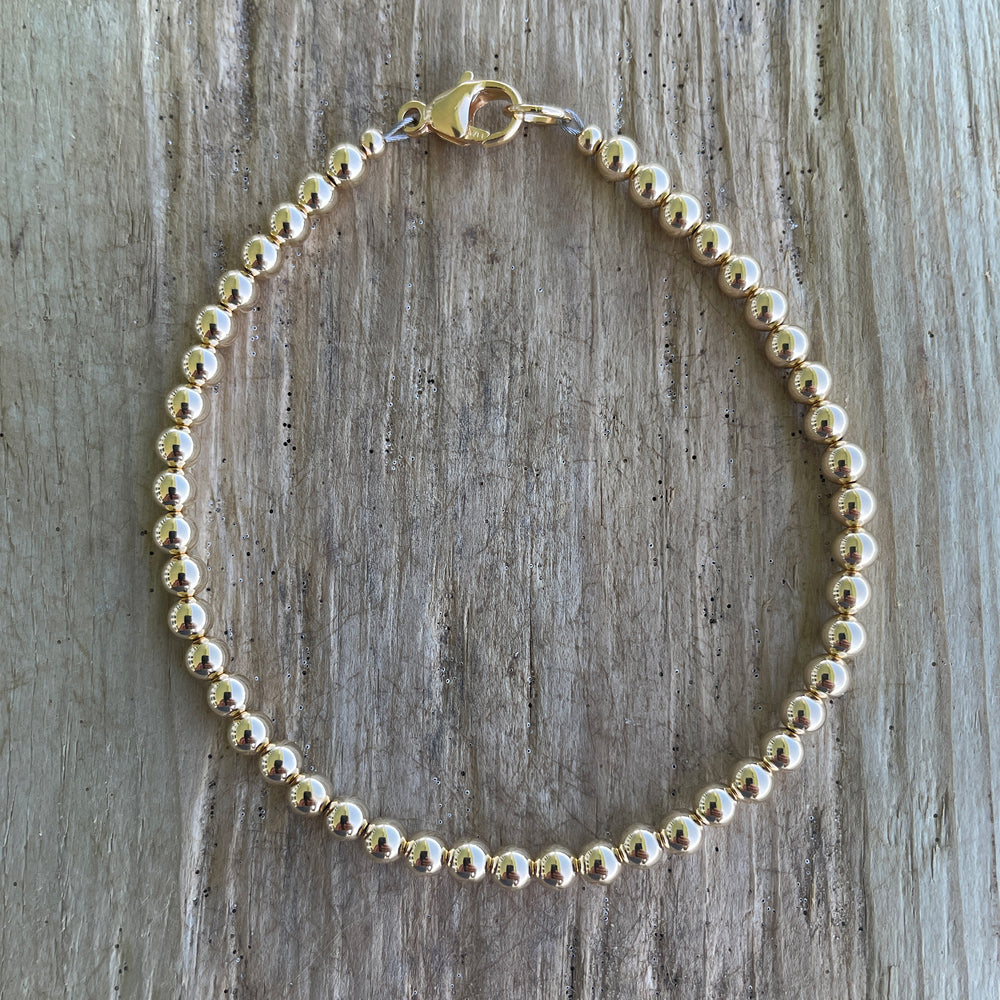 
                      
                        4mm 14K Gold Filled Bead Bracelet with Clasp
                      
                    