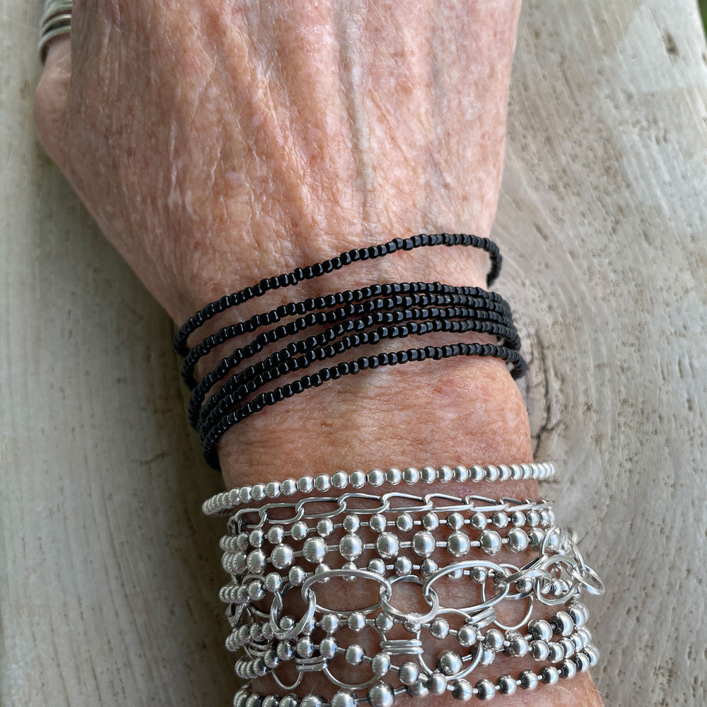 
                      
                        Black Wrap Seed Bead Bracelet
                      
                    