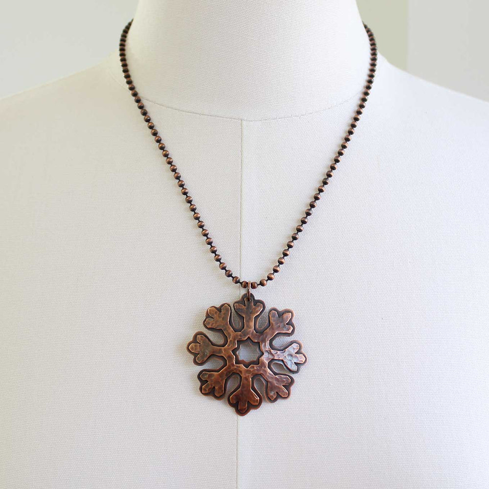 
                      
                        Handmade Copper Snowflake Necklace with 20" Chain
                      
                    