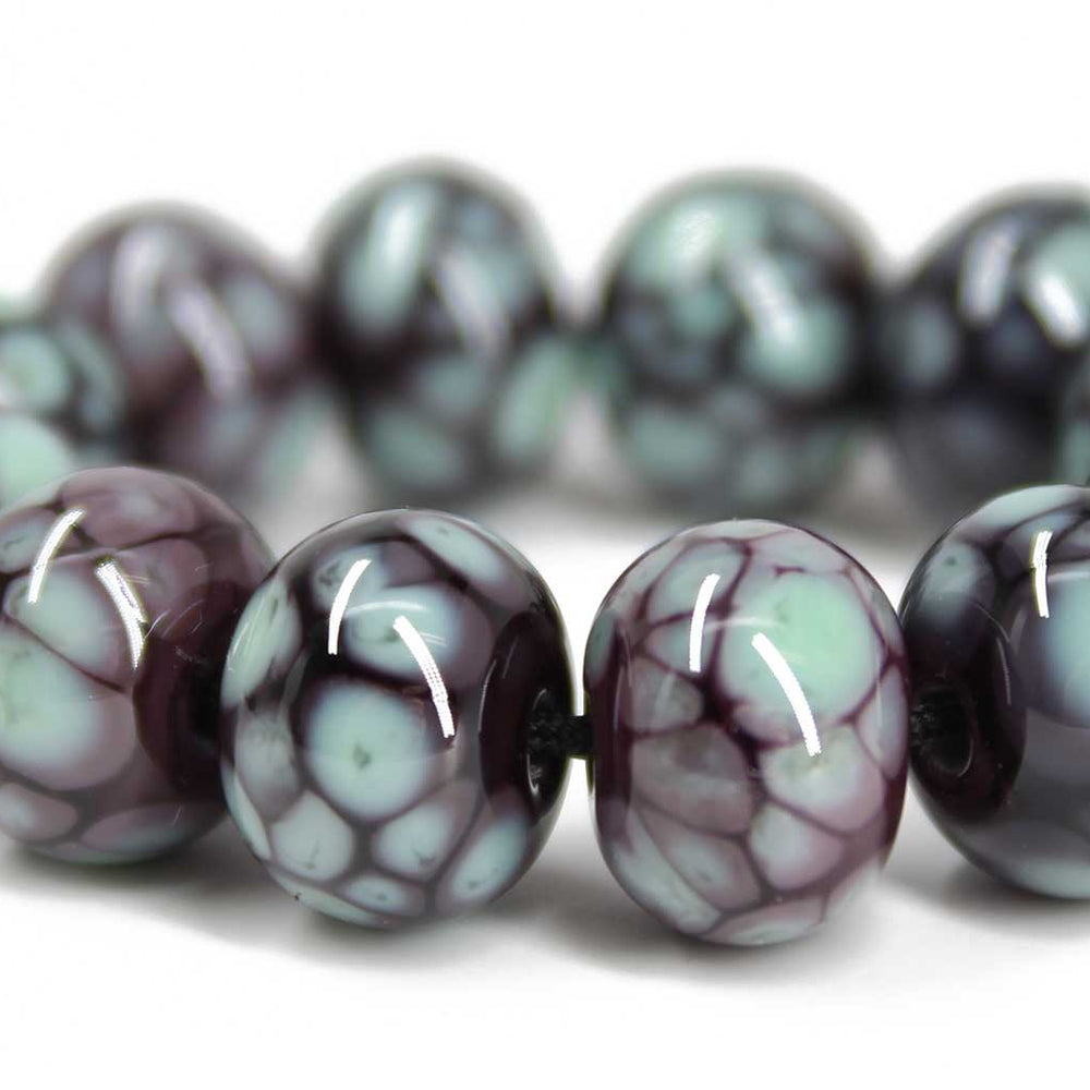 
                      
                        Turquoise and Plum Lampwork Beads
                      
                    