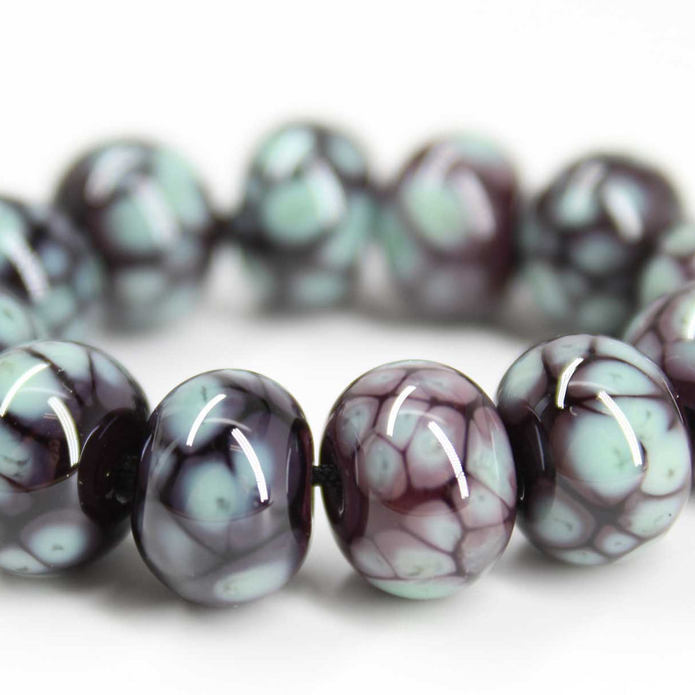 
                      
                        Turquoise and Plum Lampwork Beads
                      
                    