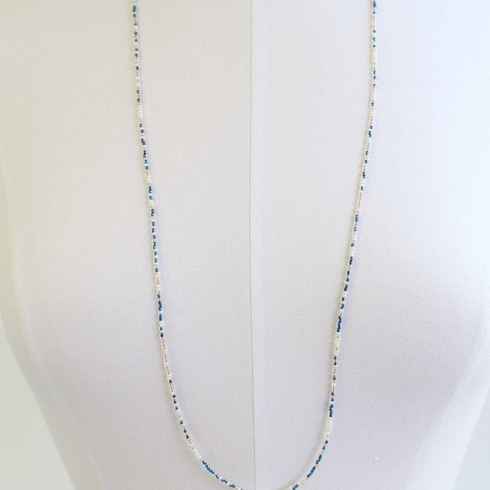 
                      
                        Blue and White Pearl Color Seed Bead Necklace
                      
                    