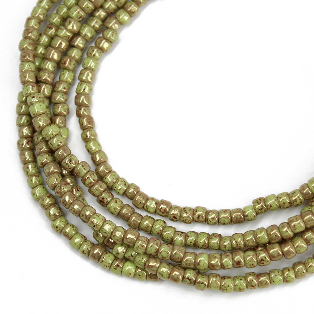 
                      
                        Marbled Opaque Avocado Seed Bead Necklace
                      
                    