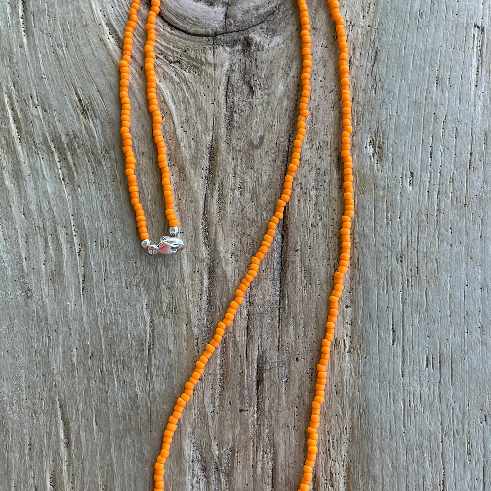 
                      
                        Matte Cantaloupe Orange Seed Bead Necklace
                      
                    