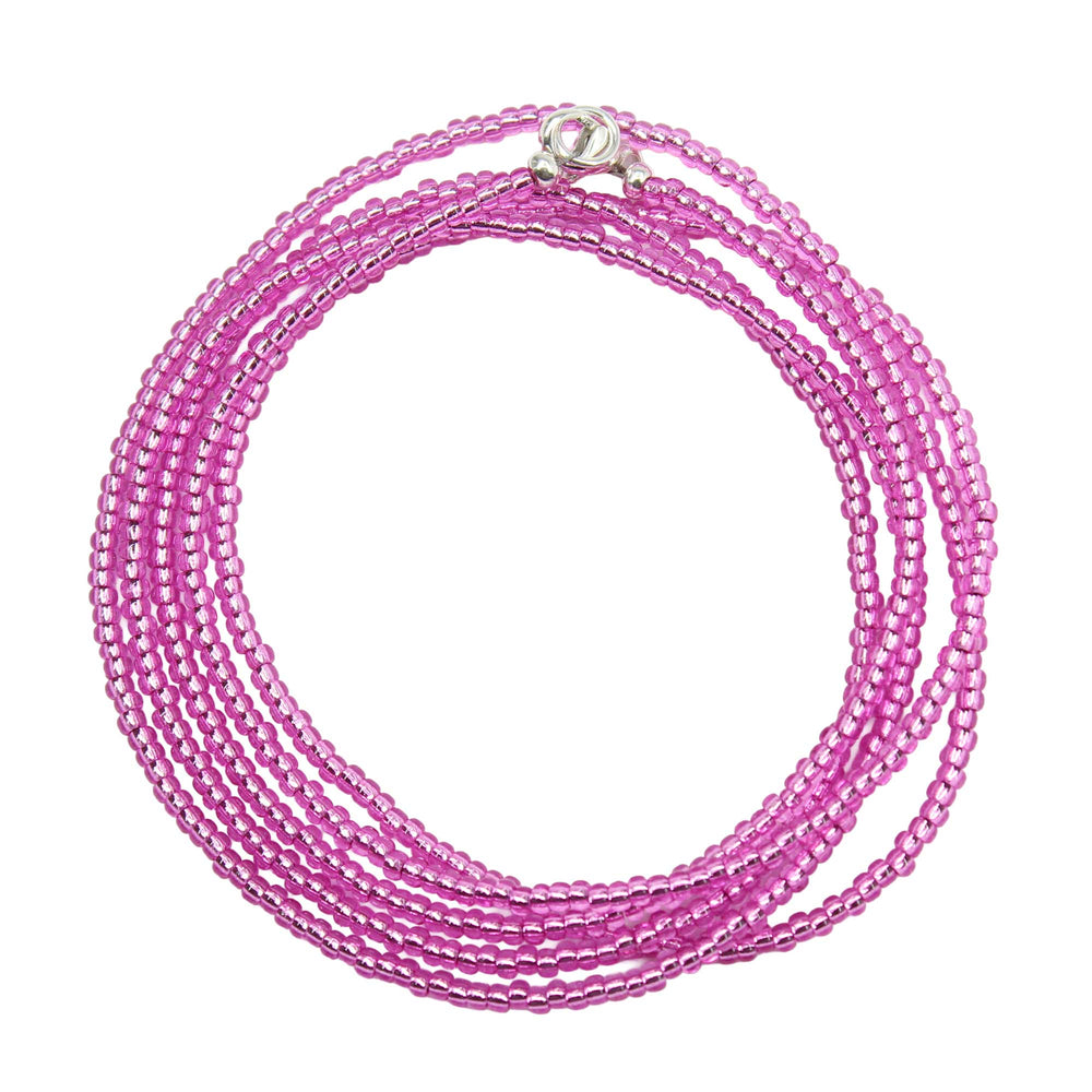 
                      
                        Pink beaded necklace on a white background
                      
                    