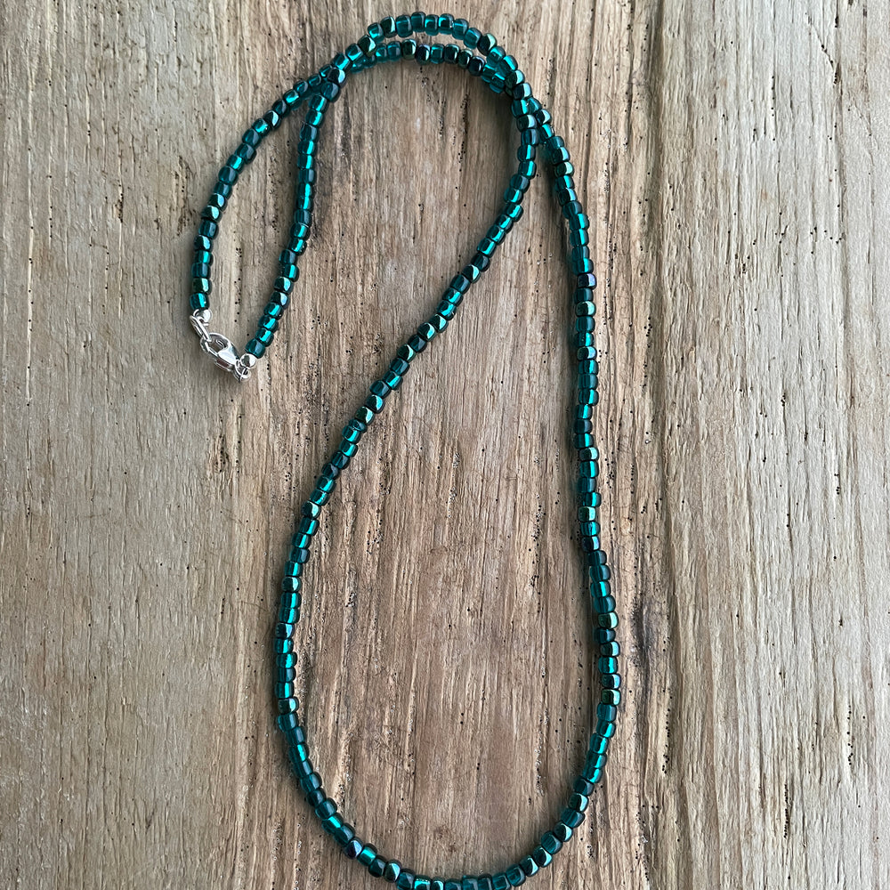 
                      
                        Metallic Teal Seed Bead Necklace
                      
                    