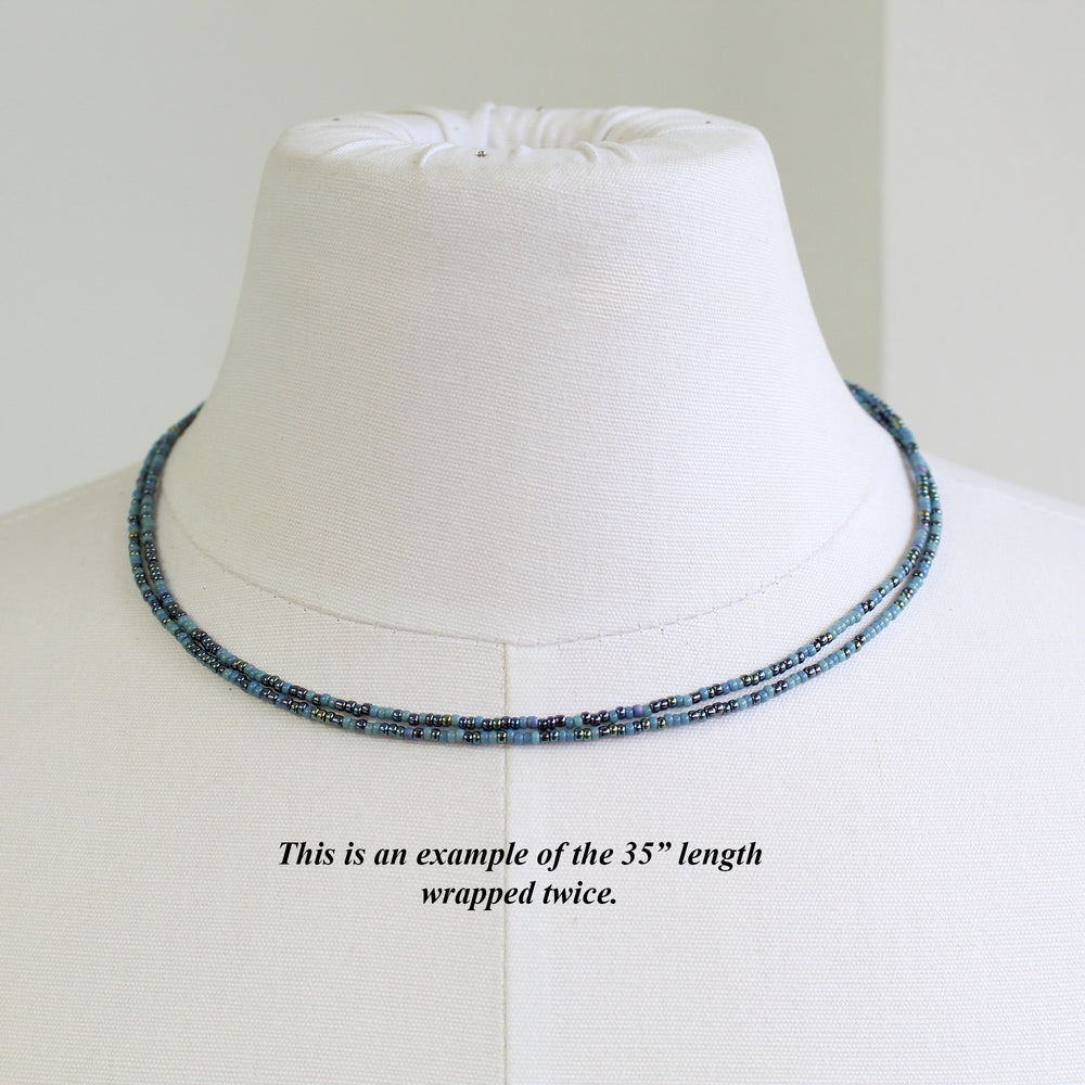 
                      
                        Mixed Blue Seed Bead Necklace
                      
                    